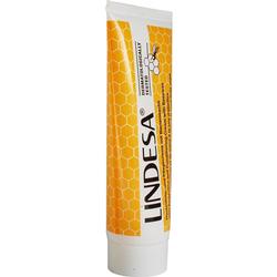Eine gelbe Tube mit Handcreme und Bienenwachs-Design.